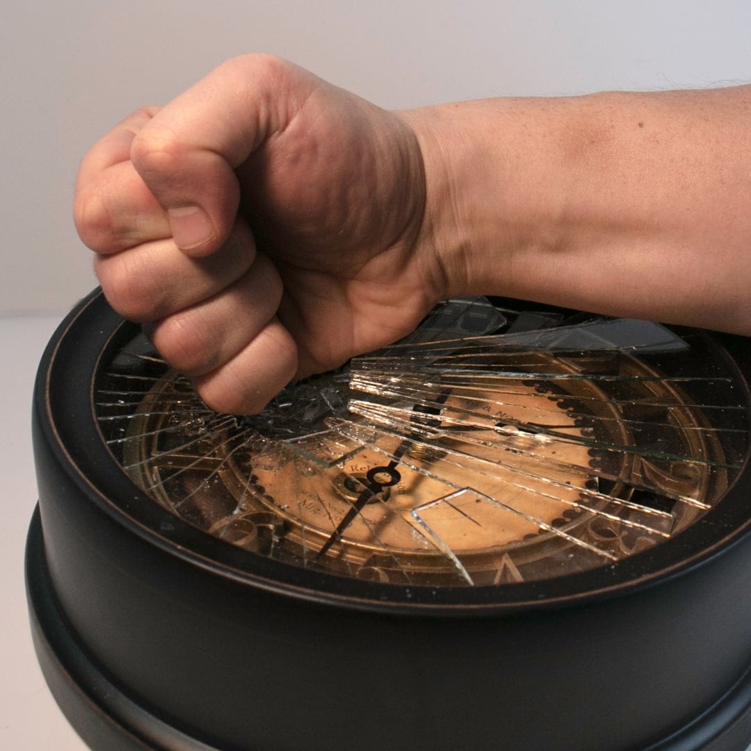 fist on broken clock